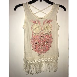 A bright colorful owl shirt.